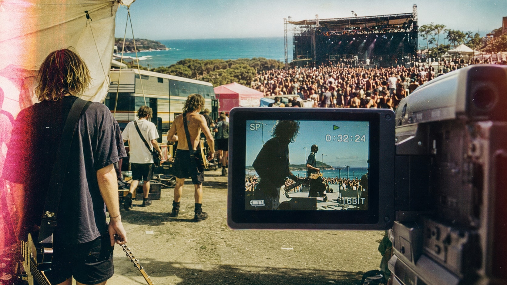 Camcorder display capturing 1990s indie bands performing at the Australian Summersault festival.