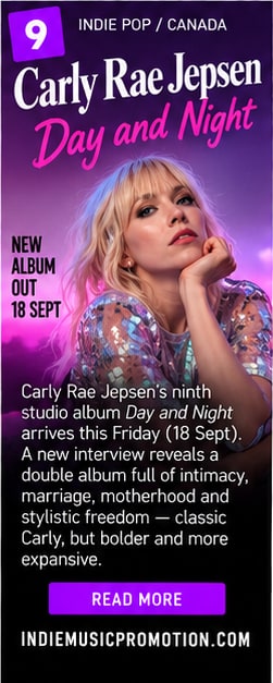 Carly Rae Jepsen in shimmering sequined dress bathed in purple and magenta stage lighting.