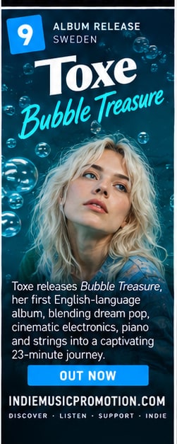 Toxe surrounded by floating blue underwater bubbles for Bubble Treasure album release.